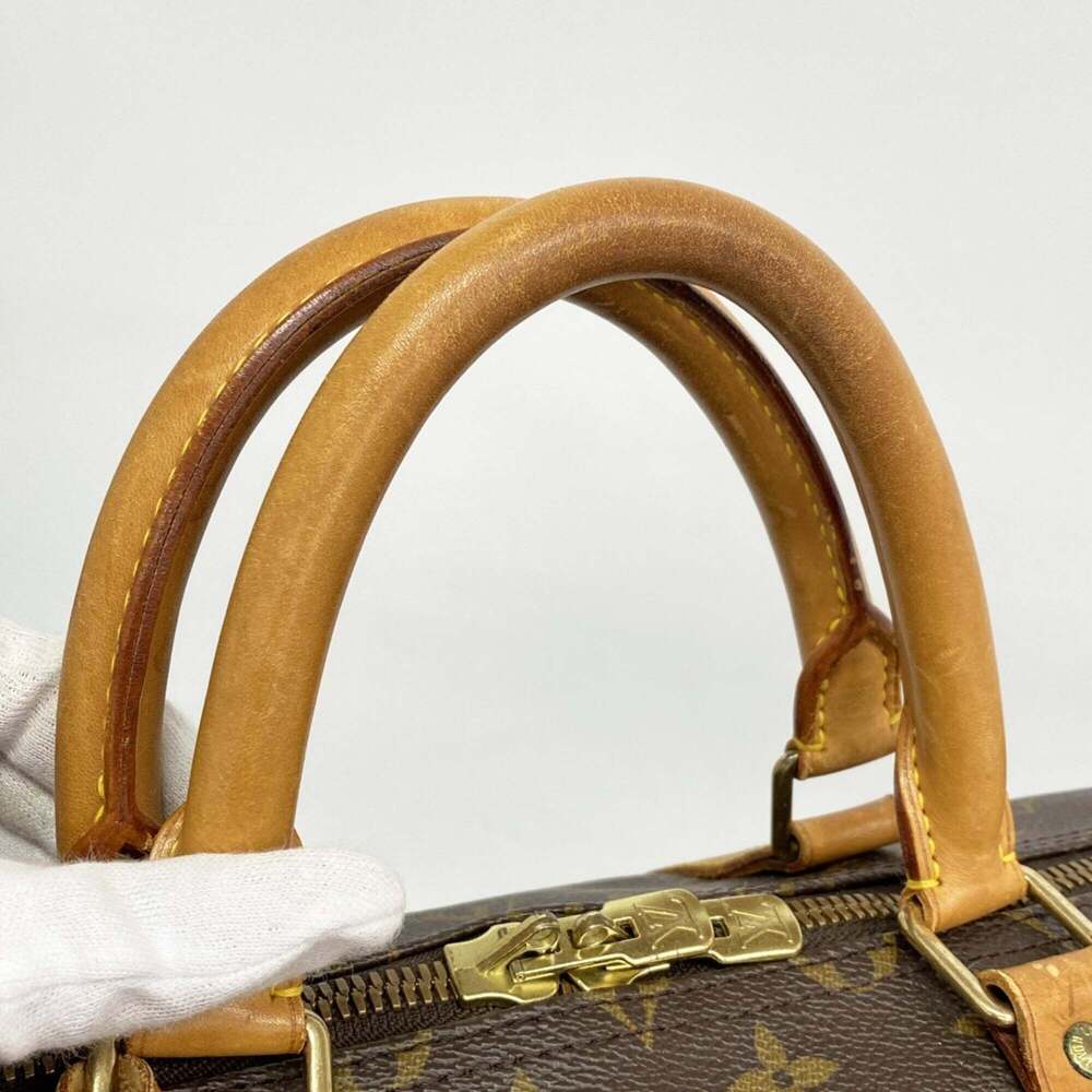 LOUIS VUITTON Brown Monogram Keepall 55 Boston Bag - Picture 10 of 11